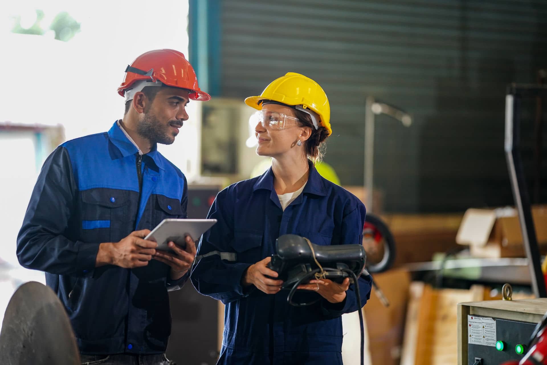 Two workers from abroad looking at each other